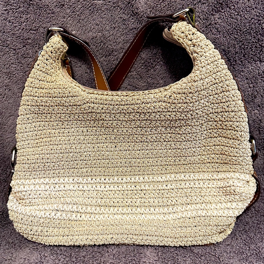 Woven bag with leather